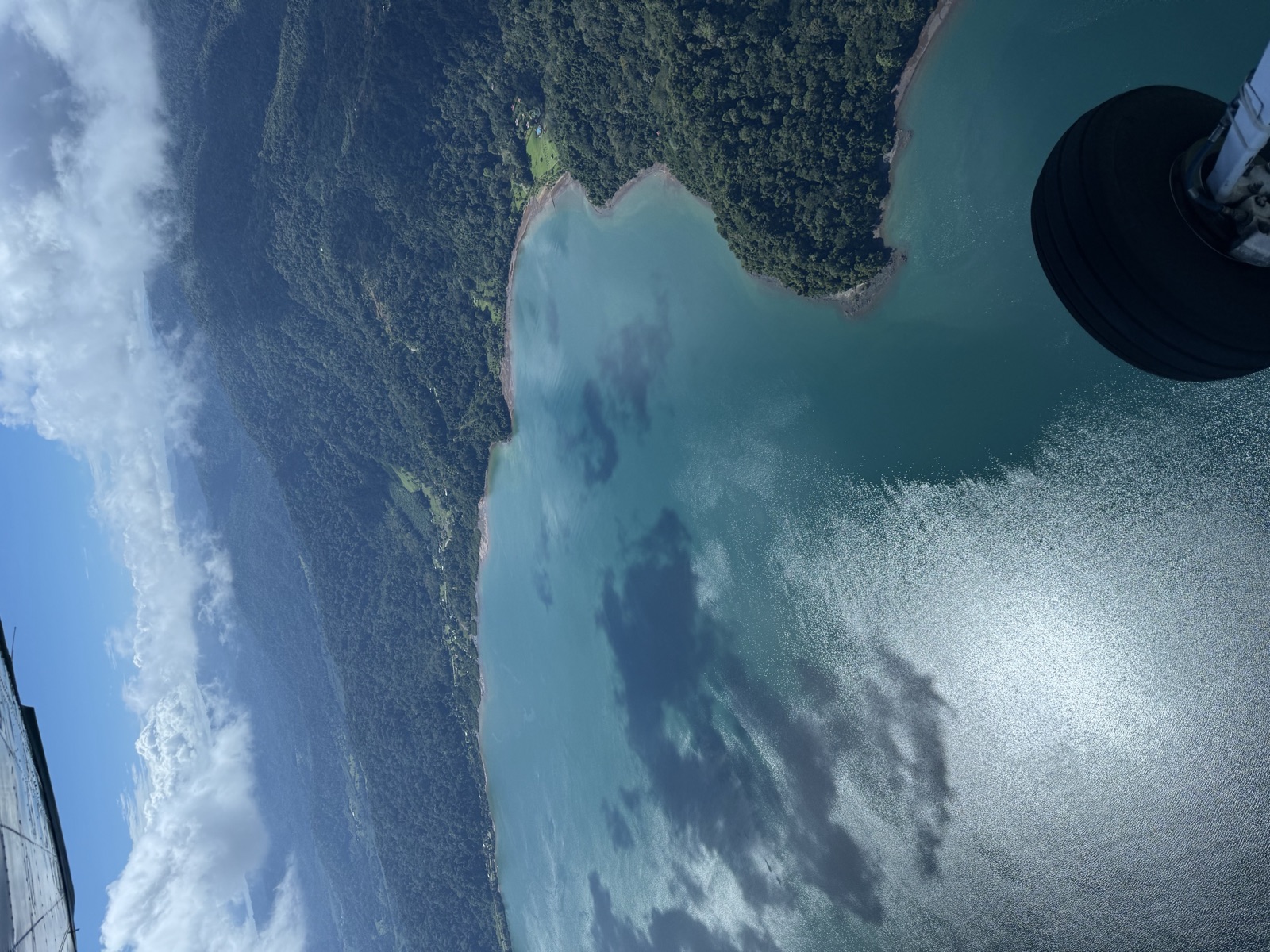 Aerial view of the Osa Peninsula — dense green rainforest meeting the Pacific Ocean